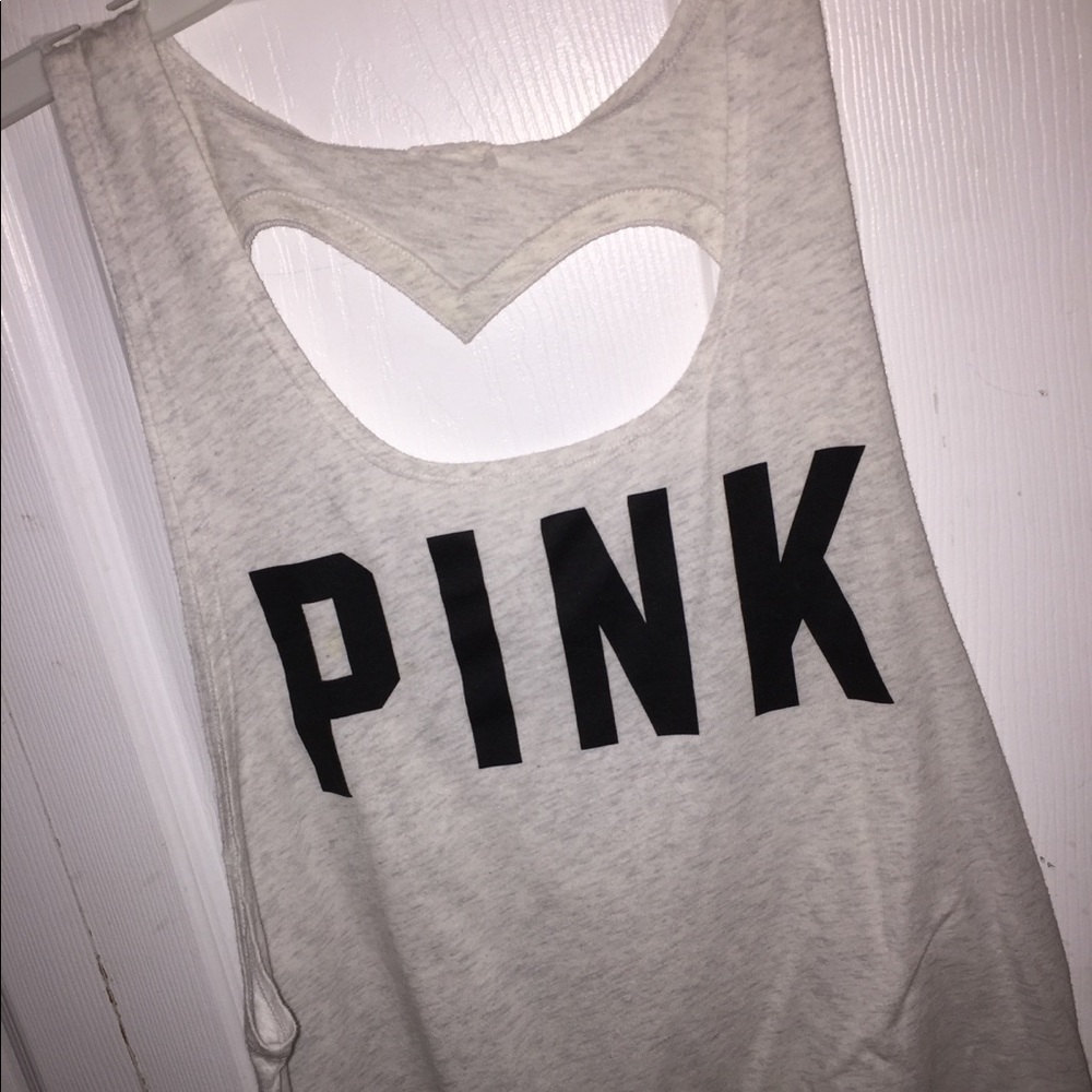 Light grey tank top with ❤️ cut-out on the back!